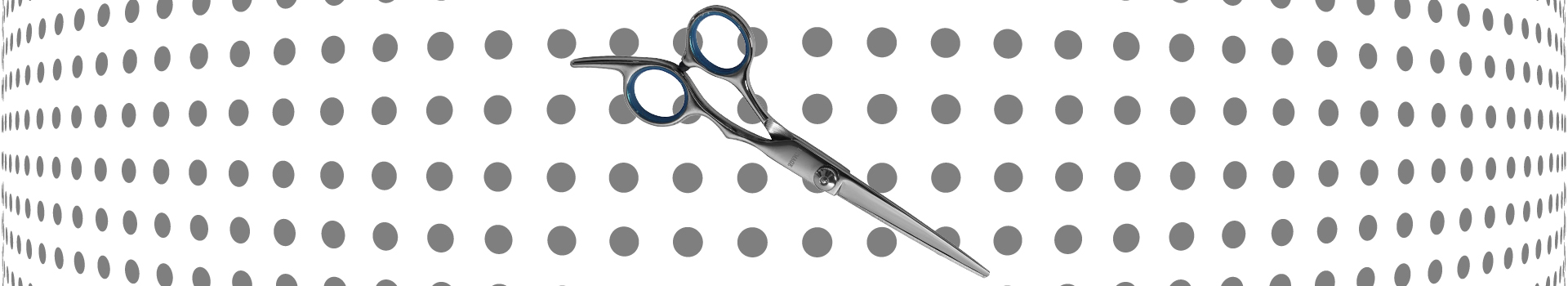 Metallic haircutting shears with offset grip